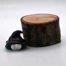 small glass dark purple gnome keepsake figure