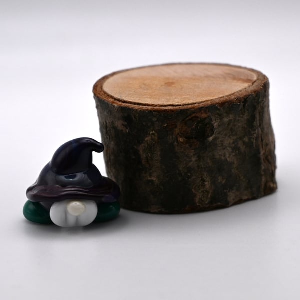 small glass dark purple gnome keepsake figure