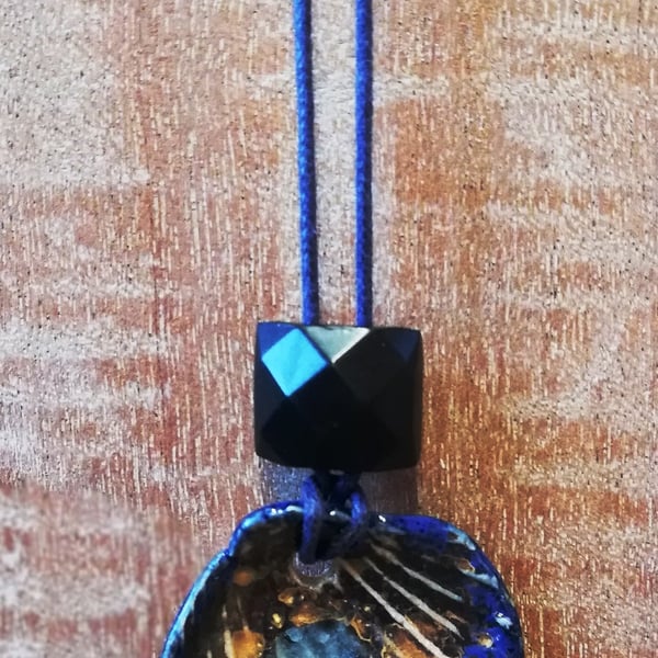 Ceramic shells and oval shaped pendant danglers