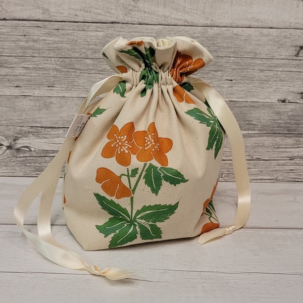 Orange floral drawstring bag