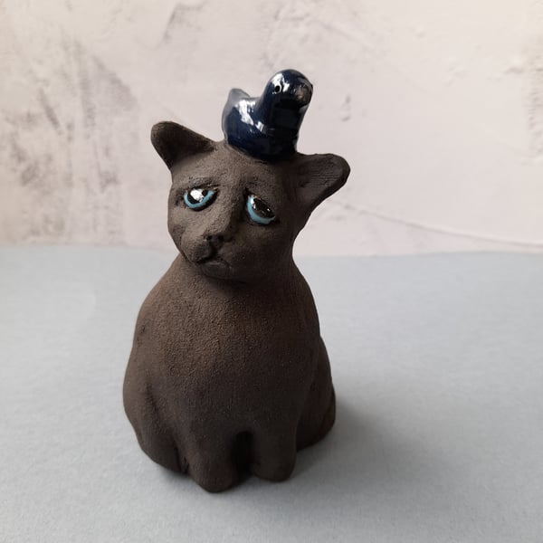 Sad Phil Ceramic Cat sculpture 