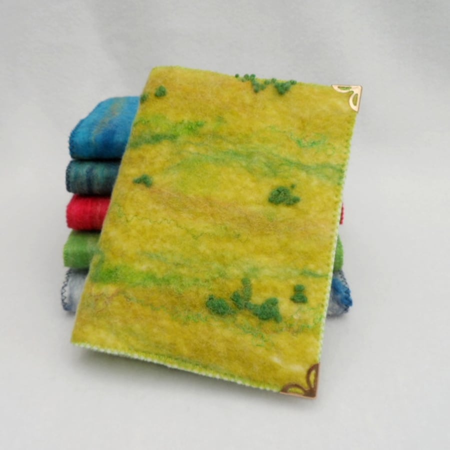 A6 notebook with removable cover felted in green shades