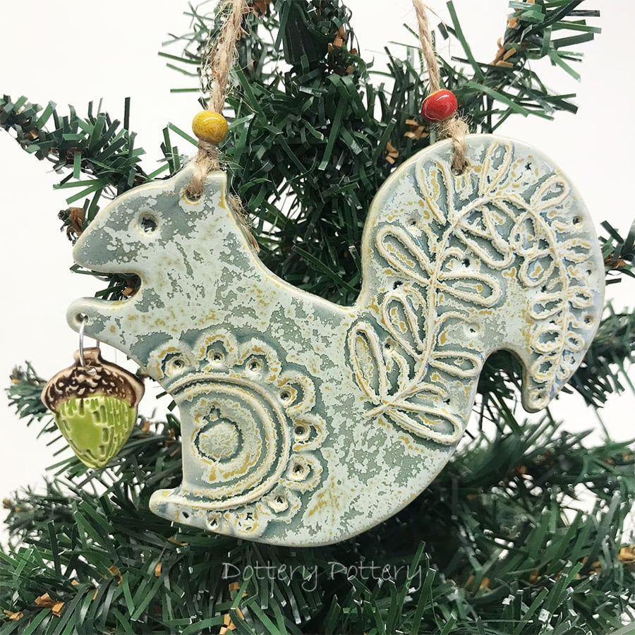 Ceramic squirrel with acorn decoration mottled blue grey