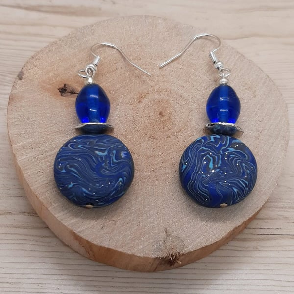 Lovely blue disc shaped polymer earrings 