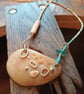 Abstract pebble pendant on glass bead necklace. - Image 3