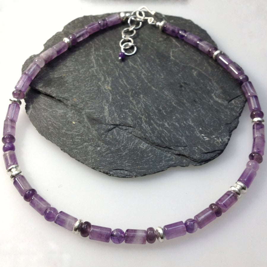 Sterling silver and amethyst bead necklace.