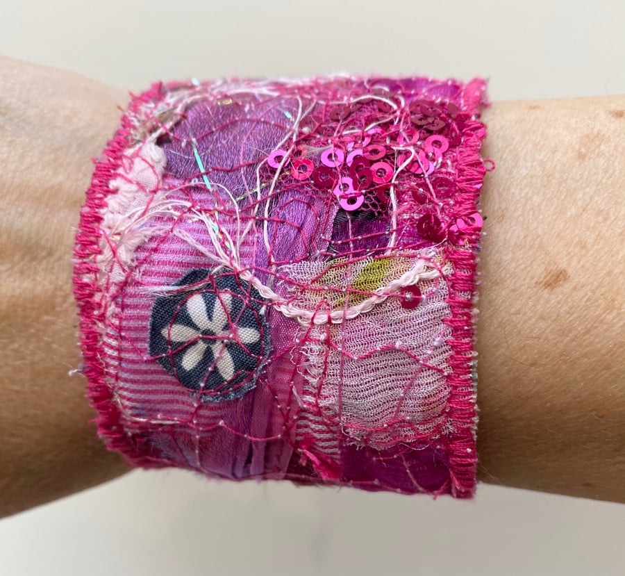 Up-cycled pink cuff bracelet or bangle.