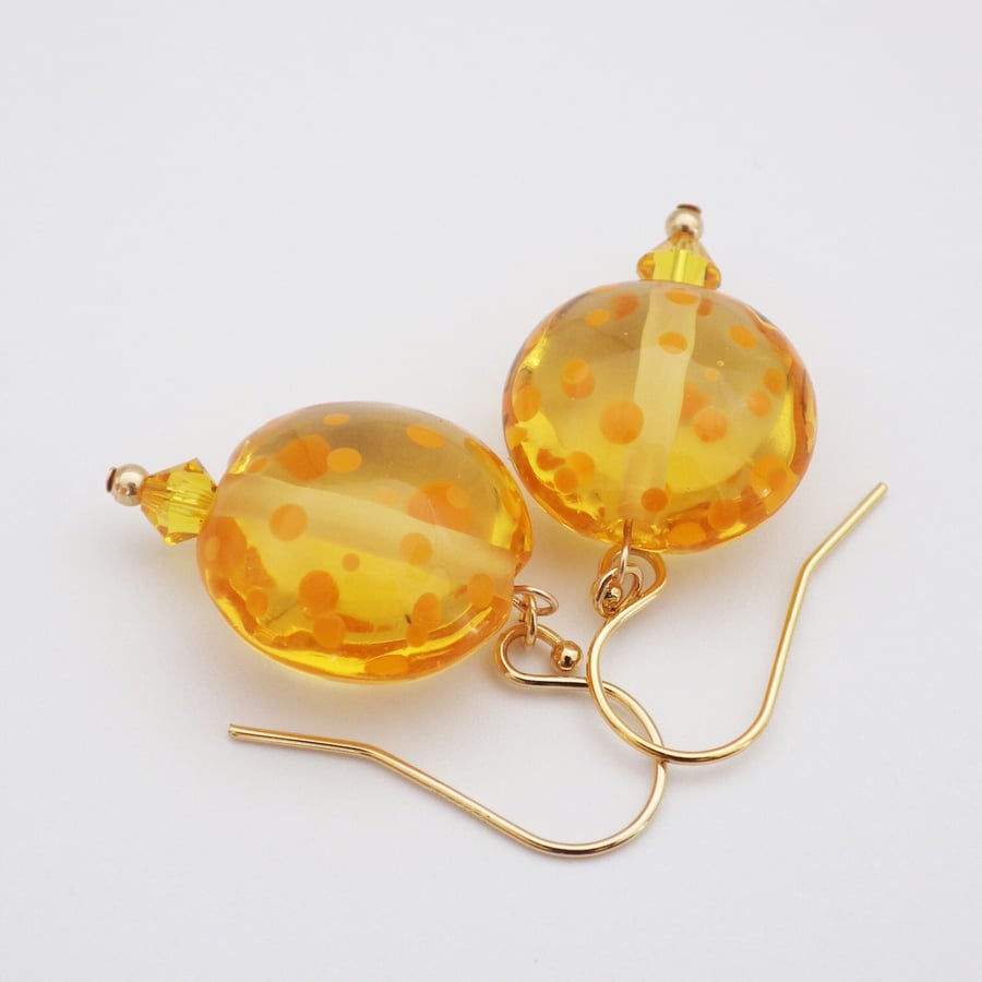 Spotty sunshine yellow lampwork lentil bead earrings