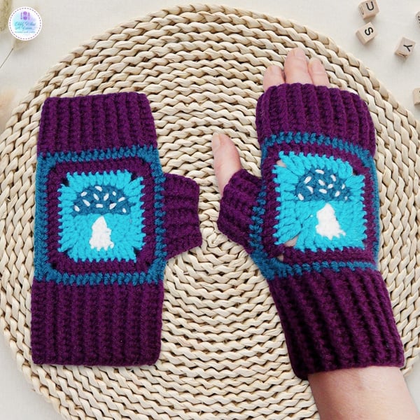 Crochet gloves in a purple, teal and white toadstool design. Toadstool gloves.