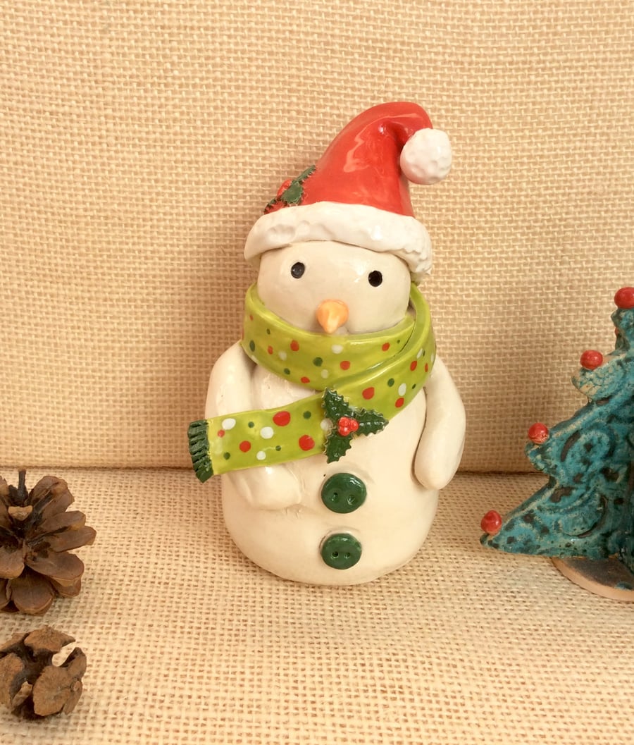 Ceramic snowman figurine with red bobble hat, holly, green and red scarf, 3t 
