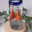 Sparkly orange dangly polymer clay earrings disc shaped earrings