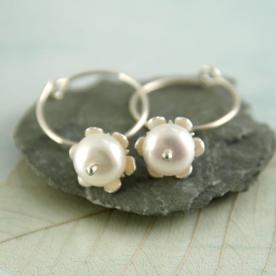 Silver Hoop Earrings with Pearl Dangles Framed in silver flower caps