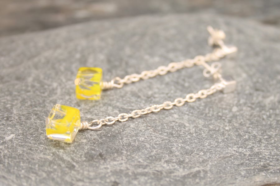 Long silver and yellow earrings