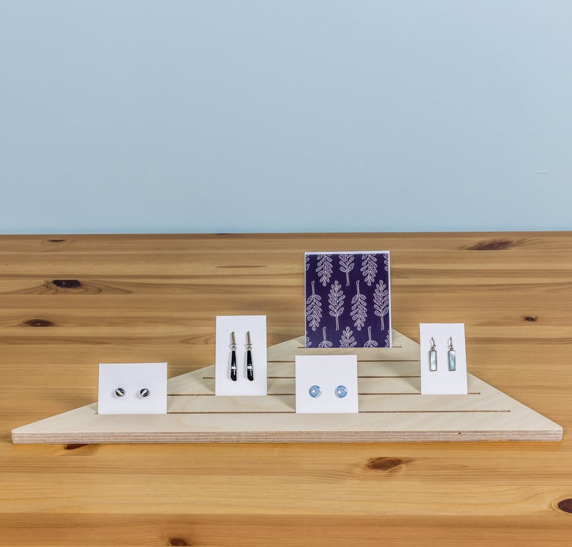 Triangular Corner Display Stand with Grooves for Cards and Jewellery in Retail