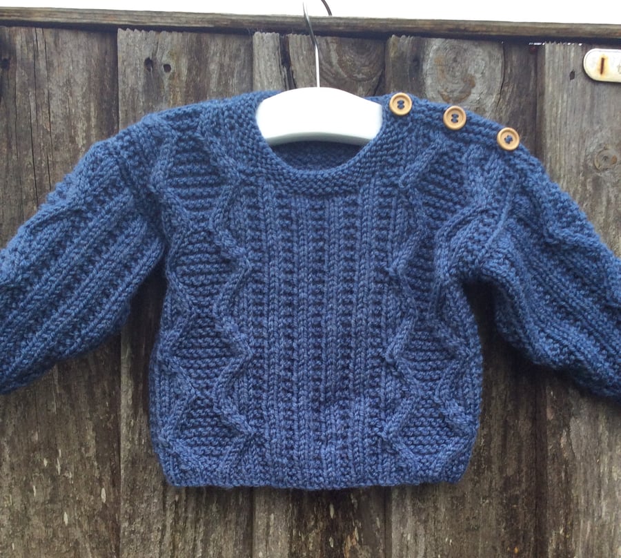 Hand knitted aran baby jumper 