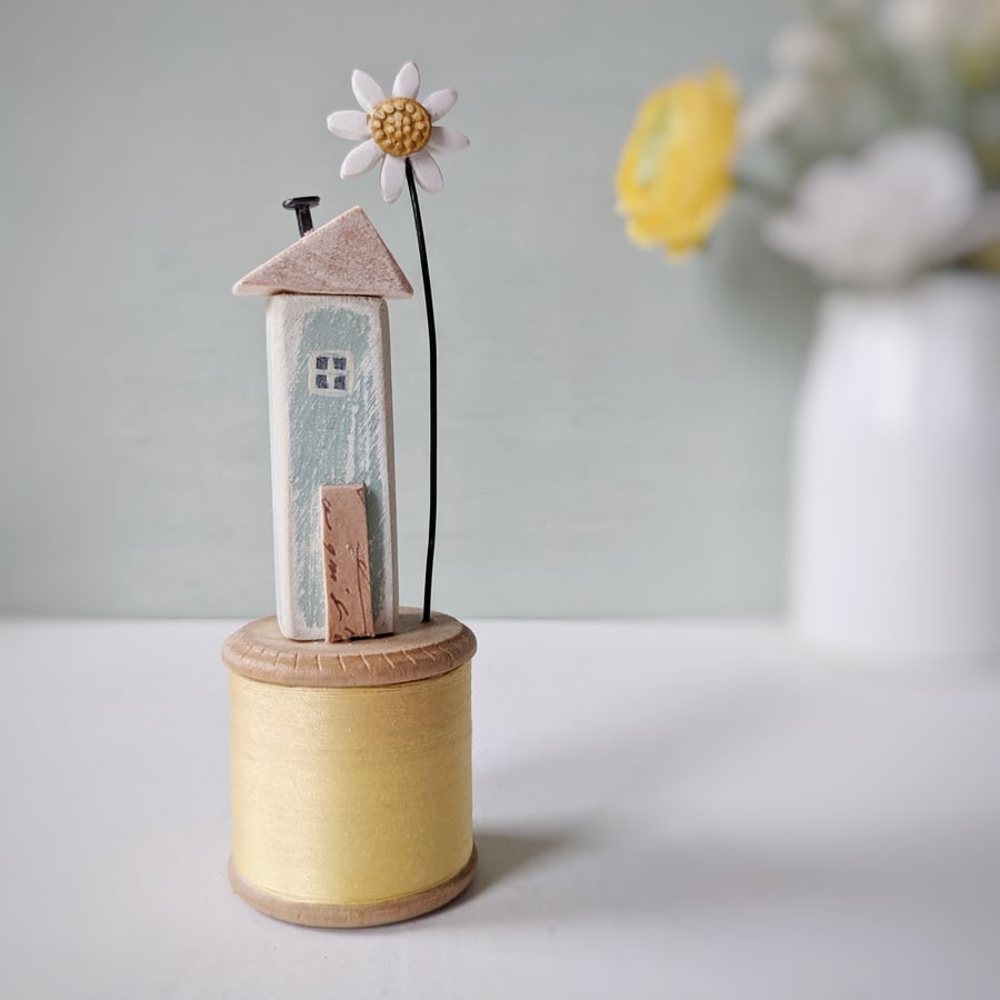 Wooden House on a Vintage Bobbin with Clay Daisy