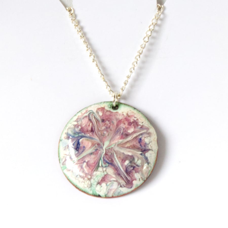 round pendant - scrolled pink and blue over white