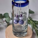 Handmade polymer clay dangly earrings in mauve  and lilac 