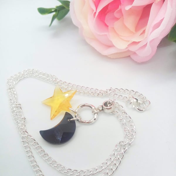 Necklace With a Small Crystal Moon and Star Elements on a Silver Chain