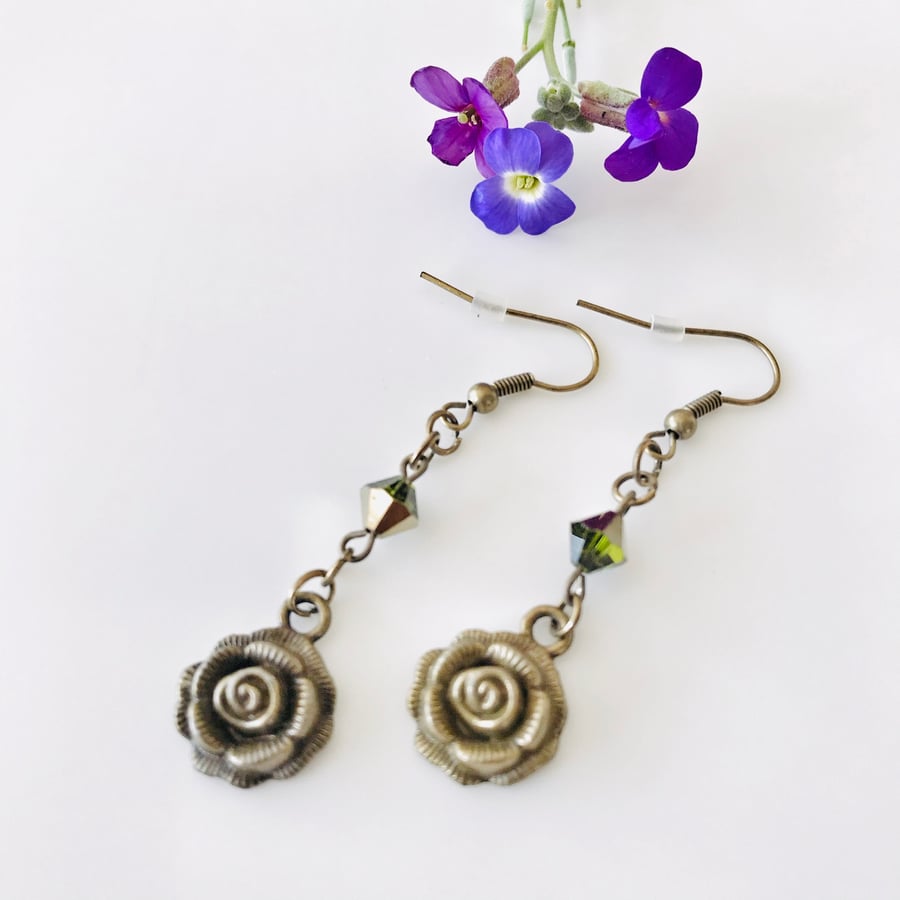 Green glass & flower dangle earrings 
