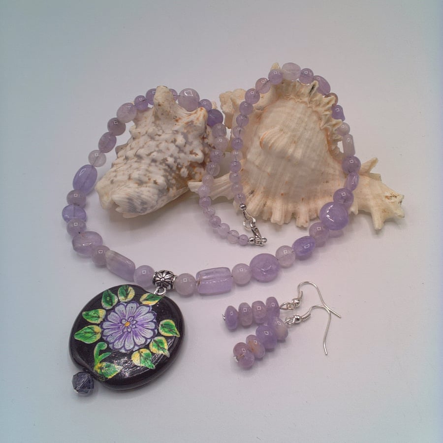 Lilac Glass Bead Necklace with a Floral Black Glass Pendant and Earrings 