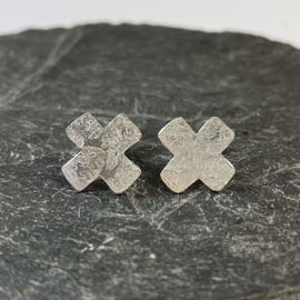 sterling silver kiss cross stud earrings