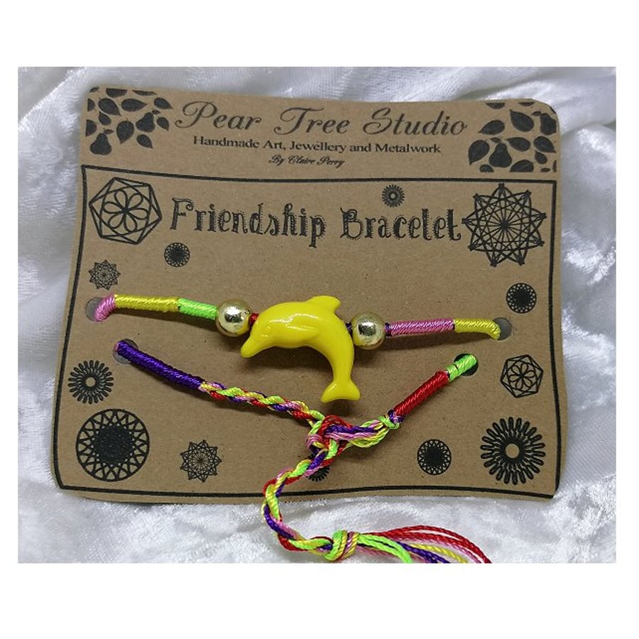 Friendship bracelet with Yellow dolphin bead.
