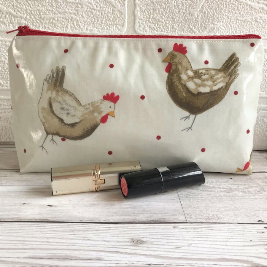 Make up bag, cosmetic bag in cream oilcloth with chickens and red polka dots