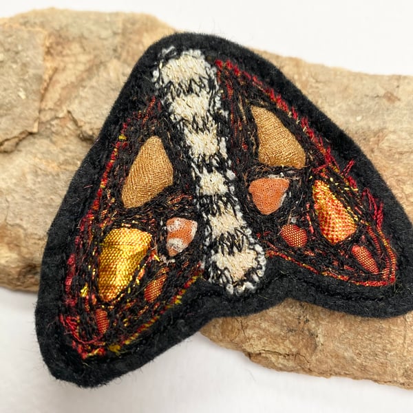 Upcycled moth brooch pin or badge. 