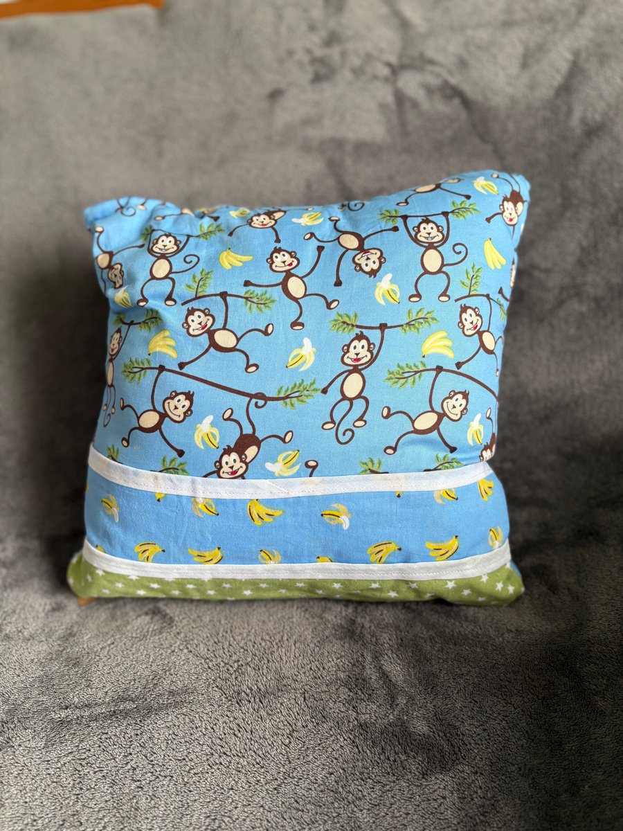 Children’s monkey and banana print cushion 