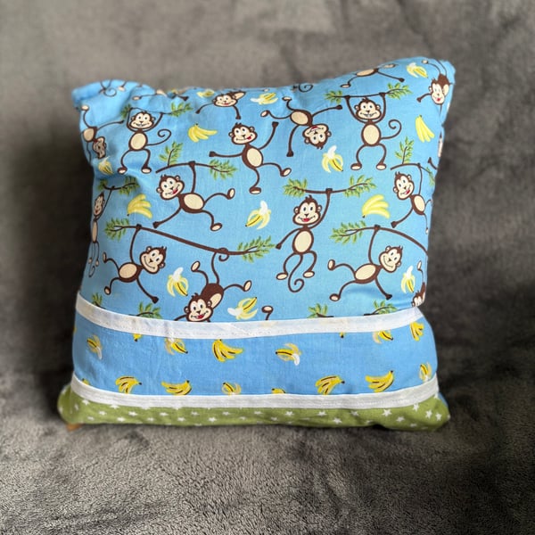 Children’s monkey and banana print cushion 