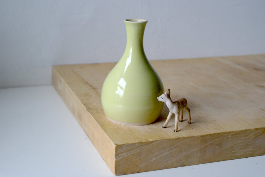 Hand thrown ceramic bottle bud vase glazed in yellow