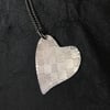 Heart shaped checkerboard pattern silver necklace