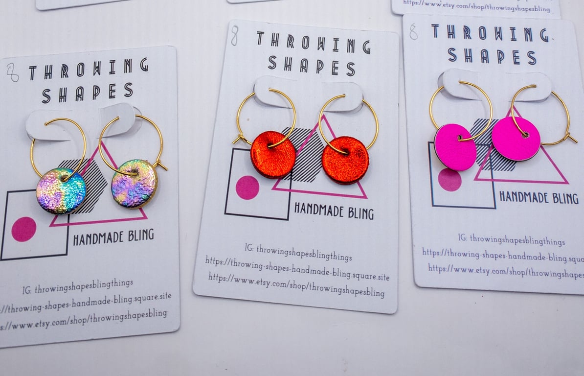 Colourful hoop earrings, reverseable leather dot earrings.