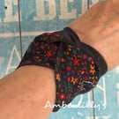 Cuff bracelet with a floral theme