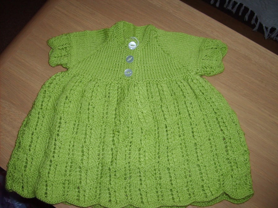 handmade knitted baby green dress