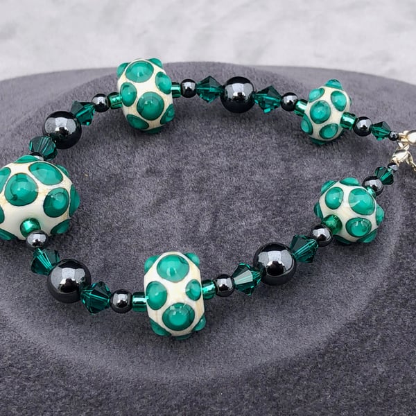 Cream and emerald green lampwork glass Swarovski Crystal and haematite necklace
