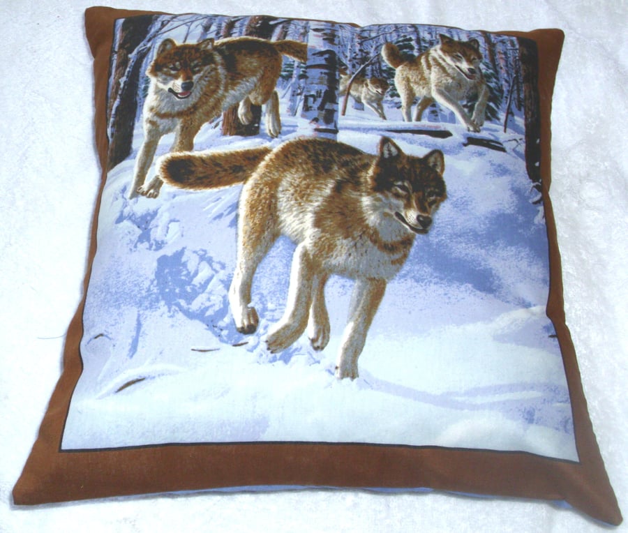 Pack of Wolves running through a Winter forest cushion 