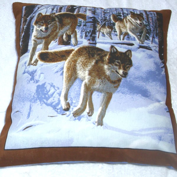 Pack of Wolves running through a Winter forest cushion 