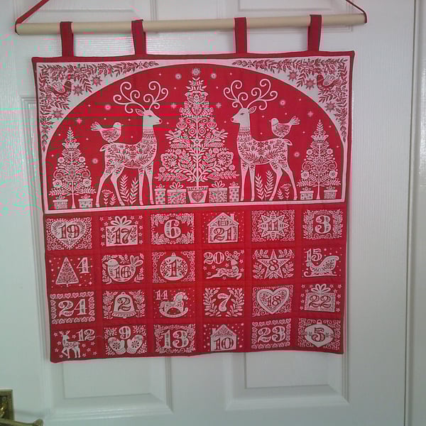 White Scandi Style Deer on a Red Background Advent Calendar