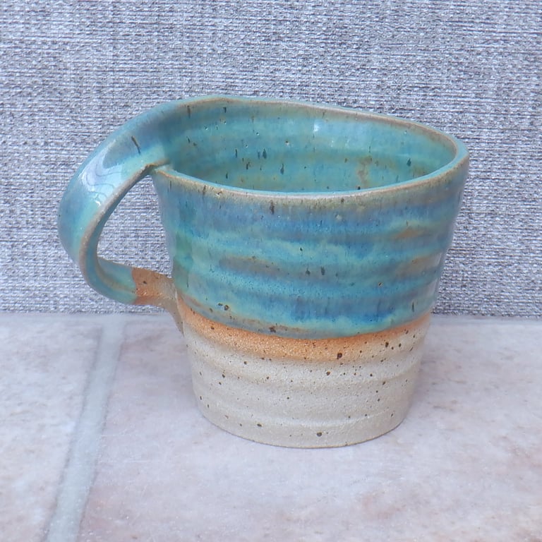Left handed coffee mug tea cup in stoneware hand thrown ceramic pottery