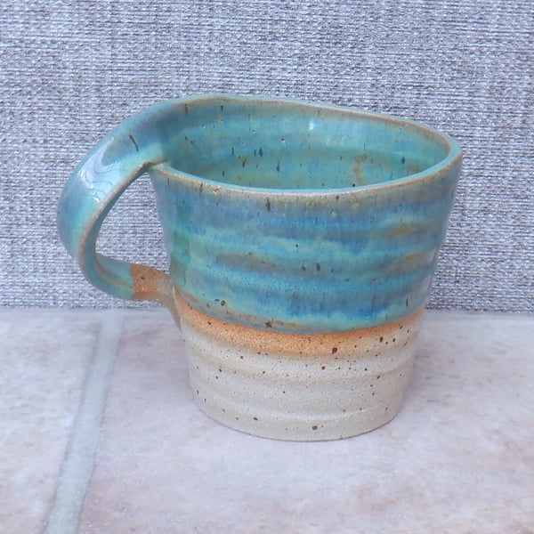 Left handed coffee mug tea cup in stoneware hand thrown ceramic pottery