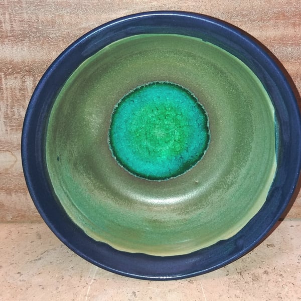 Vibrant glass centered ceramic bowl and shallow dish set