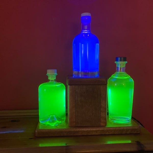 Fluorescing Bottle Table Lamp, Vivid Green and Blue, Repurposed Bottles and Wood