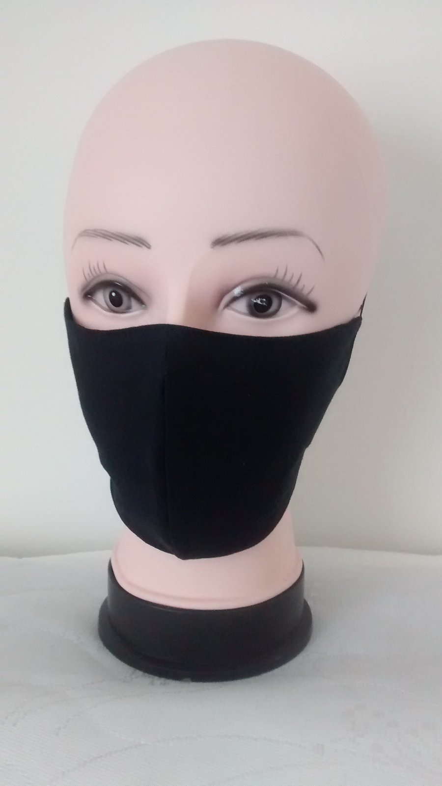 Handmade 3 layers black reusable adult face mask.