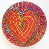 One inch badge