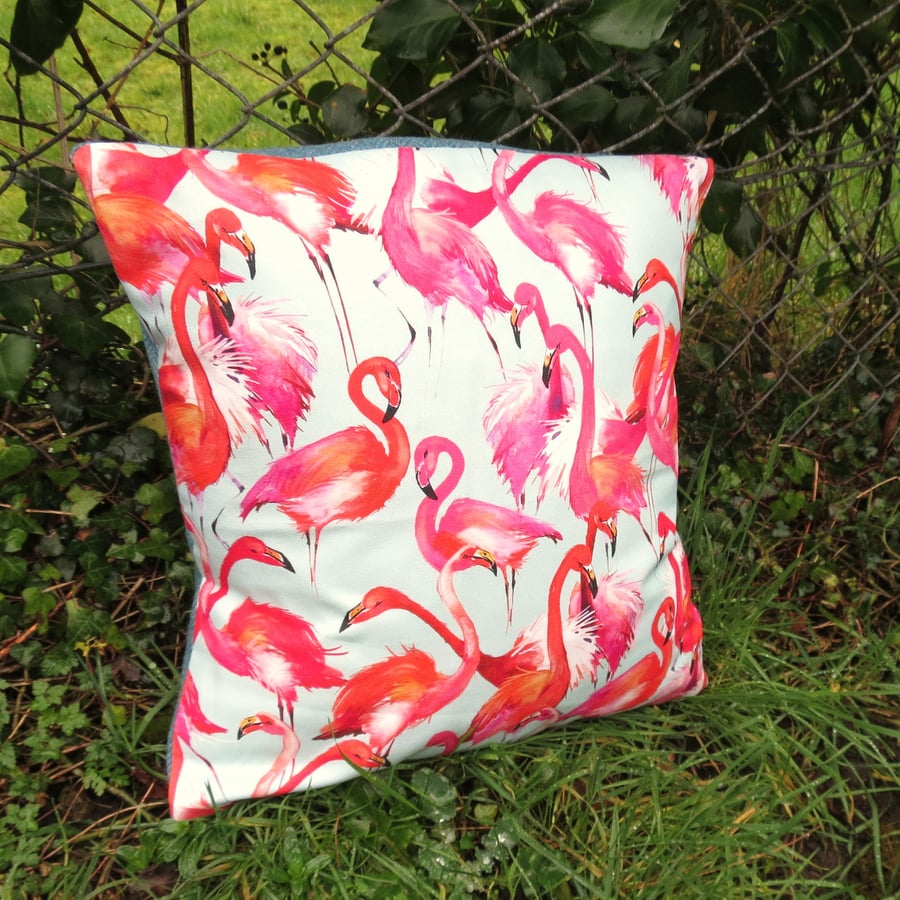 Flamingos.  A flamingo cushion complete with feather pad.  Tropical decor.