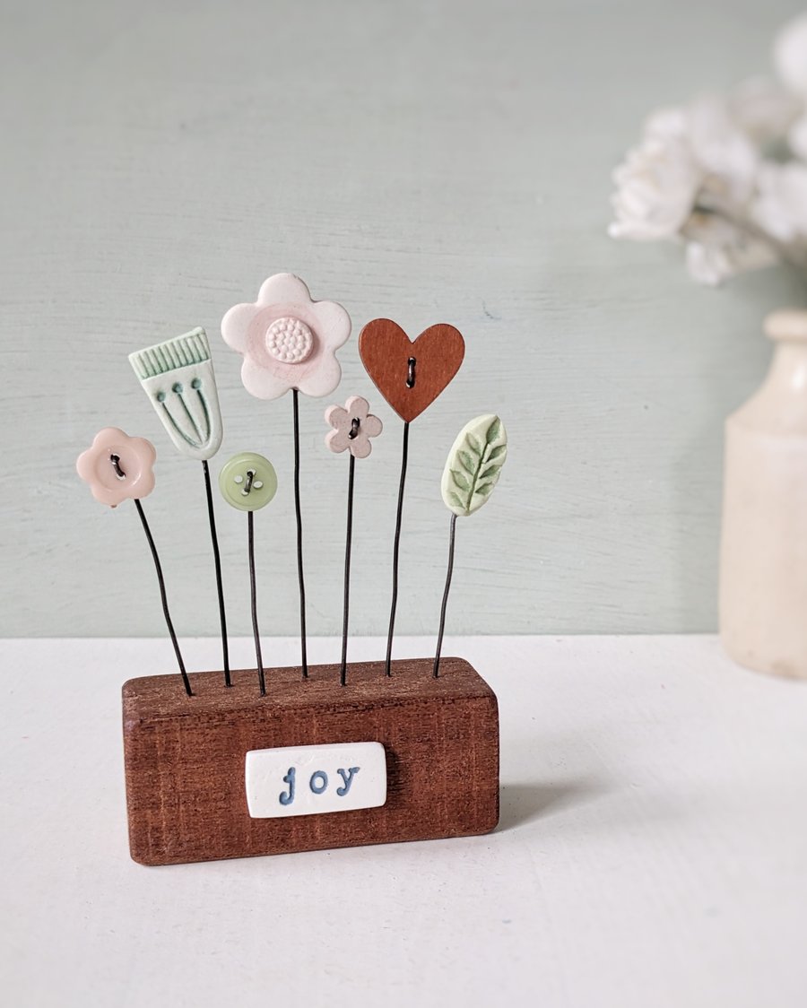 Clay and Button Flower Garden in a Wood Block 'Joy'