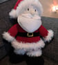 Hand knitted santa toy 