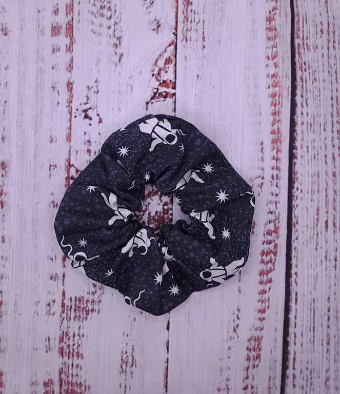 Glow in the dark astronaut scrunchie
